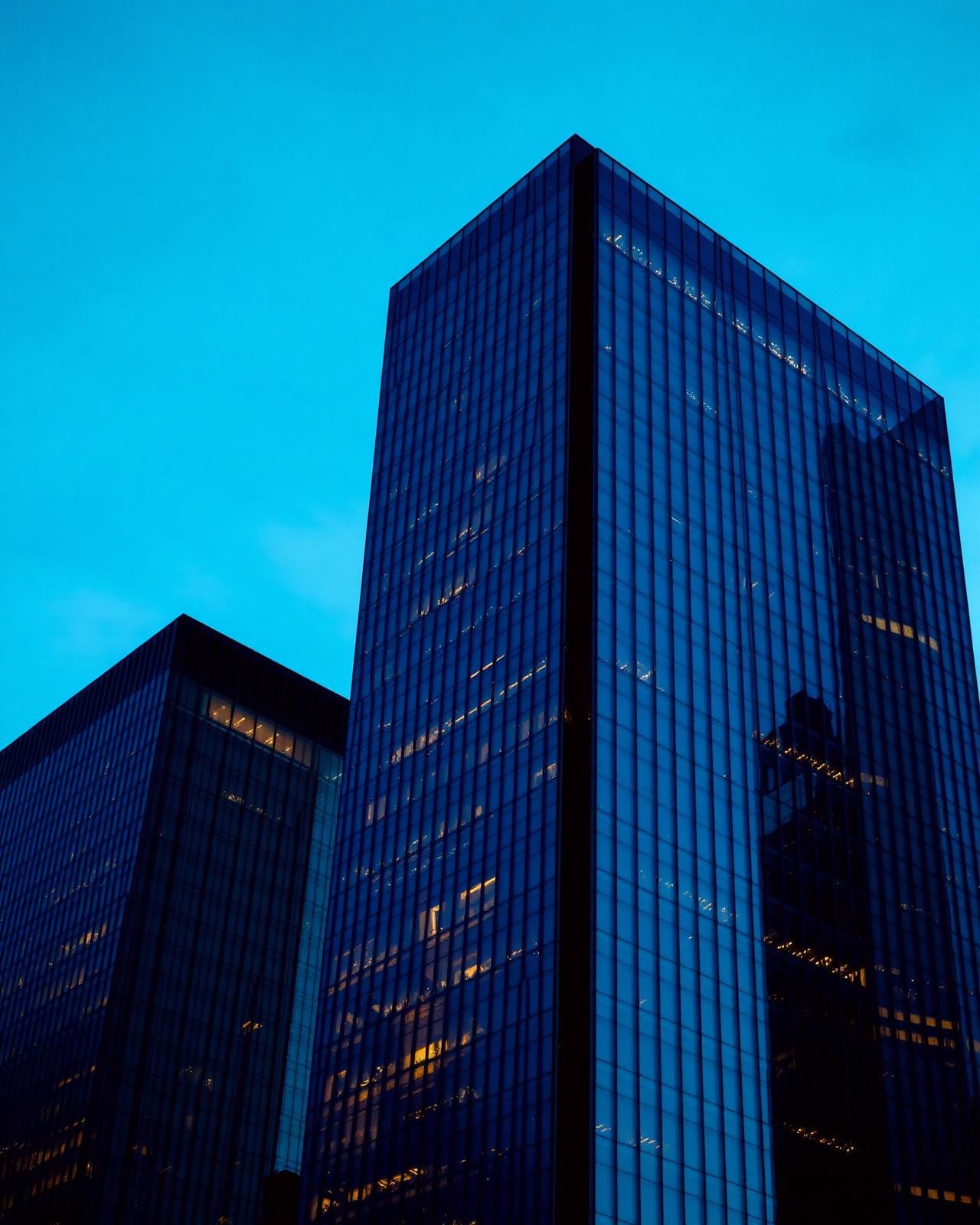 Modern corporate skyscrapers at dusk